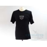 A group of three crew clothing items comprising TRANSFORMERS : THE LAST KNIGHT (2017) black short