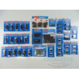 A large quantity of OO gauge PECO point motors and accessories - VG/E in G/VG packets (40)