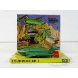 A DINKY 101 Gerry Anderson's 'Thunderbirds' Thunderbirds 2 & 4 in gloss green with yellow legs,