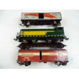 A group of vintage FLESICHMANN HO gauge American Outline rolling stock comprising a diesel