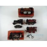 A group of O gauge clockwork and electric locomotives by HORNBY and others for spares/repair - F