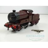 A HORNBY SERIES O gauge clockwork No.501 steam locomotive and tender in LMS livery numbered 5600,