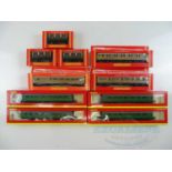 A group of HORNBY OO gauge passenger coaches in various liveries - G/VG in G/VG boxes (10)