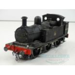 A kitbuilt finescale O gauge ex-Midland Railway Johnson 1377 class 0-6-0 steam tank locomotive in BR