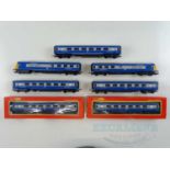 A group of TRI-ANG OO gauge Blue Pullman rolling stock - in later yellow end livery - comprising
