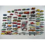 A large quantity of unboxed playworn diecast cars and trucks by MATCHBOX, DINKY and others - F