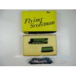 A pair of TRIX OO gauge locomotives comprising a boxed 'Flying Scotsman' in LNER livery (VG in G