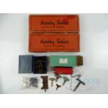 A group of mostly HORNBY O gauge accessories and other items including points, a wagon, clockwork