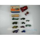 A group of DINKY cars, vans and trucks mostly in playworn condition - F/G in F boxes (where