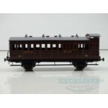 A kitbuilt finescale O gauge North Staffordshire Railway 4 wheel compartment coach with birdcage