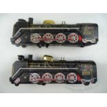 A pair of MASUDAYA / MODERN TOYS Japanese tin plate battery operated steam locomotives numbered