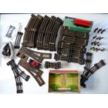 A large quantity of HORNBY O gauge 3-rail track, together with wagons, other accessories and a group