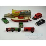 A group of tinplate toys to include a HORNBY speedboat together with cars and lorries by TRI-ANG