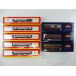 A group of OO gauge passenger coaches comprising 3 x BACHMANN coaches in maroon and 5 x HORNBY