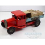 A large TRI-ANG tinplate tipper truck with wooden crate load - F/G (unboxed)