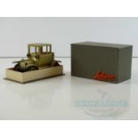 A SCHUCO 1227 promotional reproduction Old-Timer Ford in gold livery with a cigarette lighter in the