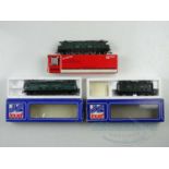 A group of JOUEF HO gauge French outline electric locomotives in SNCF green livery - G/VG in G boxes