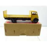 A DINKY SUPERTOYS 513 Guy Flat Truck, 1st Style Cab with Tailboard in yellow/dark blue in early