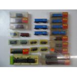 A mixed group of N gauge locomotives and rolling stock by MINITRIX and PECO - G/VG in G boxes (where