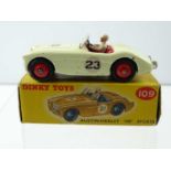 A DINKY 601 Austin Healey '100' sports, racing number 23, white/red interior, red hubs - G in G