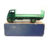 A DINKY 513 Guy Flat truck with Tailboard, 1st Style Cab - dark green cab and chassis and mid-