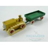 A KANSAS TOY & NOVELTY CO. slush cast Whoopee Caterpillar Tractor & Trailer, circa early 1930s, some