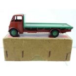 A DINKY 512 Guy Flat Truck, 1st style cab, in green / brown cab/chassis - G in F/G early utility