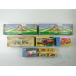 A group of CORGI CLASSICS and ATLAS DINKY to include several circus/fair related lorries, some