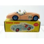 A DINKY 111 Triumph TR2 Sport car in salmon - incorrectly placed numbers to front wings rather