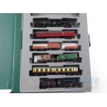 A group of GRAHAM FARISH N gauge rolling stock comprising a pair of steam locomotives (Ivatt class 2