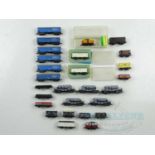 A group of mostly unboxed N gauge British outline wagons by MINITRIX and PECO - G/VG in G boxes