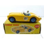 A DINKY 109 Austin Healey '100' Sports, yellow/blue interior, blue hubs, no decal on bonnet (factory