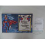 SUPERMAN - A Metropolis Museum Superman award together with letter of authenticity (2 in lot)