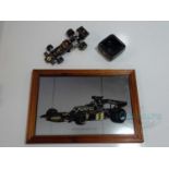 A group of John Player Special Formula 1 Racing souvenirs comprising a mirror; ashtray and model car