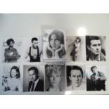 A large group of film stills, headshots and promotional photos to include David Bowie and Leonardo