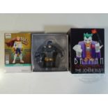 A group of 3 figures comprising a LEMILLION figure, a BATMAN Eaglemoss figure and a Batman The