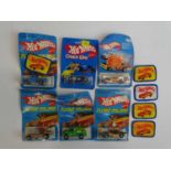 A group of MATTEL Hot Wheels Flying Colors and Crack Ups examples - circa 1970s - all sealed on