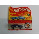 A MATTEL Hot Wheels Redline 1970 'King Kuda' in blue sealed on original card with button - VG/E on G