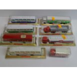 A group of MAJORETTE buses and articulated lorries all sealed in original bubble packs - VG/E in G/