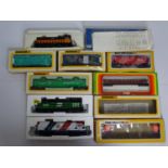 A group of HO gauge American outline rolling stock by BACHMANN and AHM/MEHANO comprising 3x diesel