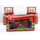 A group of LGB G scale coaches comprising 1x 3000 brown 4-wheel coach and 2x 3041 Zoo/Carnival