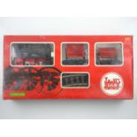 An LGB G scale 20601T starter goods train set comprising loco, tipper wagon, track and transformer -