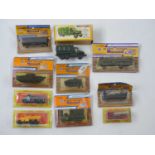 A group of HO scale civilian and military lorries and tanks by ROCO and others - VG in G boxes (10)