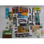 A group of N gauge wagons, track and accessories by various manufacturers - G/VG in F/G packets