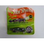 A MATTEL Hot Wheels Redline Exclusive Racing Car Series TNT Bird with button and sticker sheet on