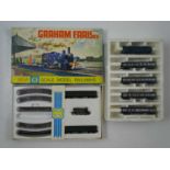 A pair of vintage N gauge train sets comprising a GRAHAM FARISH NPS.3 passenger set in original