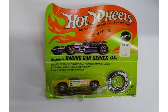 A MATTEL Hot Wheels Redline 1970s 'Snake' in yellow sealed on a Racing Car Series card with button - Image 1 of 6