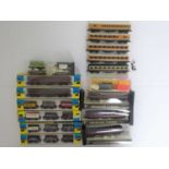 A group of boxed and unboxed N gauge wagons and coaches mostly by GRAHAM FARISH - G/VG in G boxes (