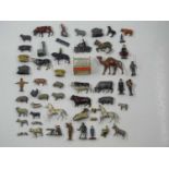 A mixed group of unboxed vintage diecast animals, soldiers and other figures by BRITAINS and