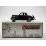 A BROOKLIN BRK.90A hand bult white metal, 1:43 scale model of a 1935 Plymouth Deluxe 3-window coupe,